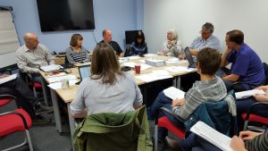 Saturday External Verifiers meeting around board meeting table at SQA