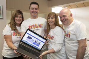 SQA Volunteers with laptop